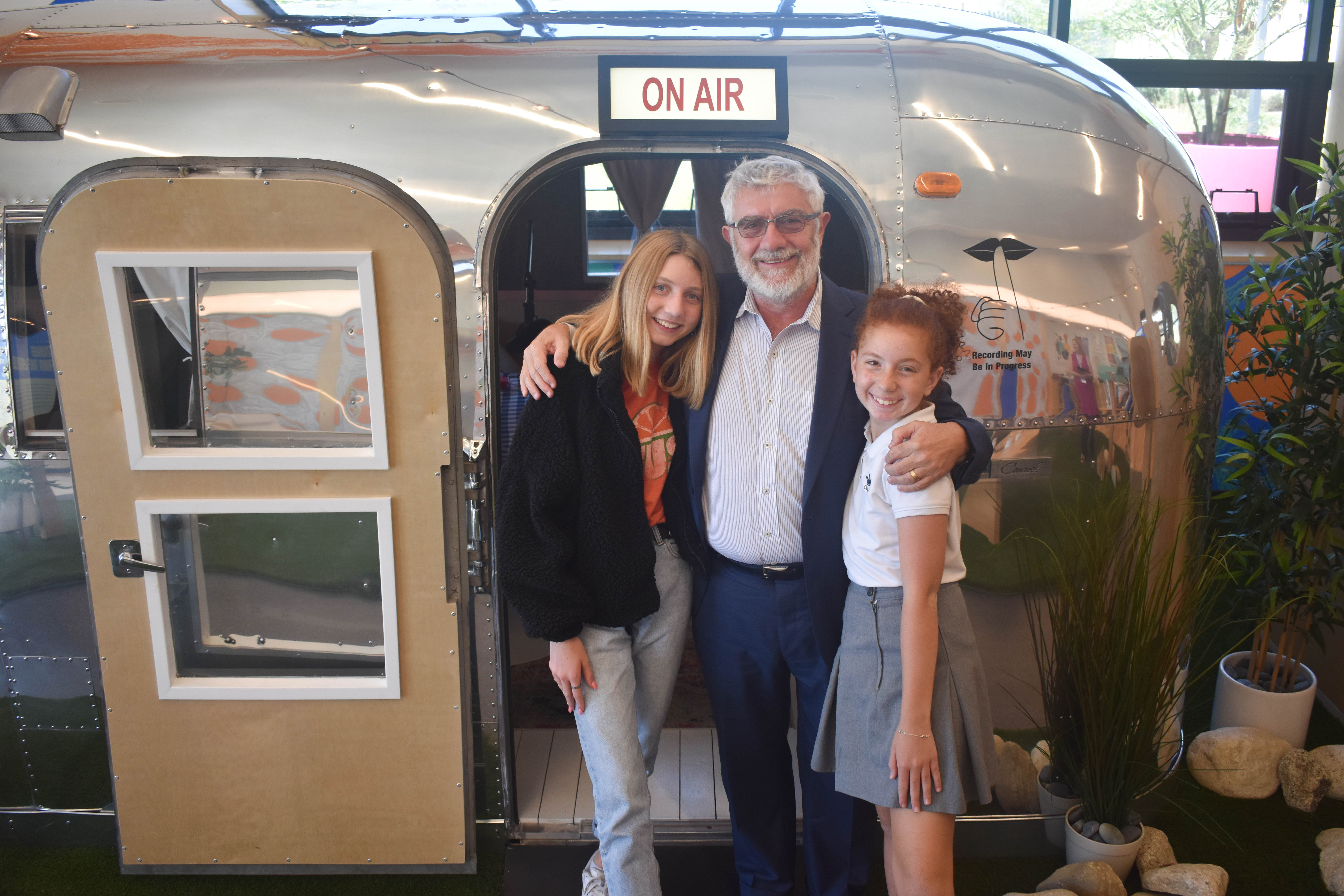 From left, Ariana, President Struppa, and Athena.