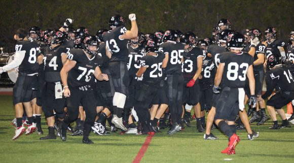 football team celebrating