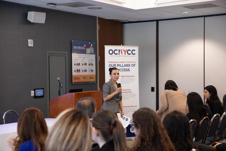 Panel moderator Gabriela Castañeda, assistant director of Chapman’s Argyros School Career Services, welcomes attendees to the Women Empowerment panel discussion sponsored by the Orange County Hispanic Youth Chamber of Commerce. The event was hosted at Chapman.