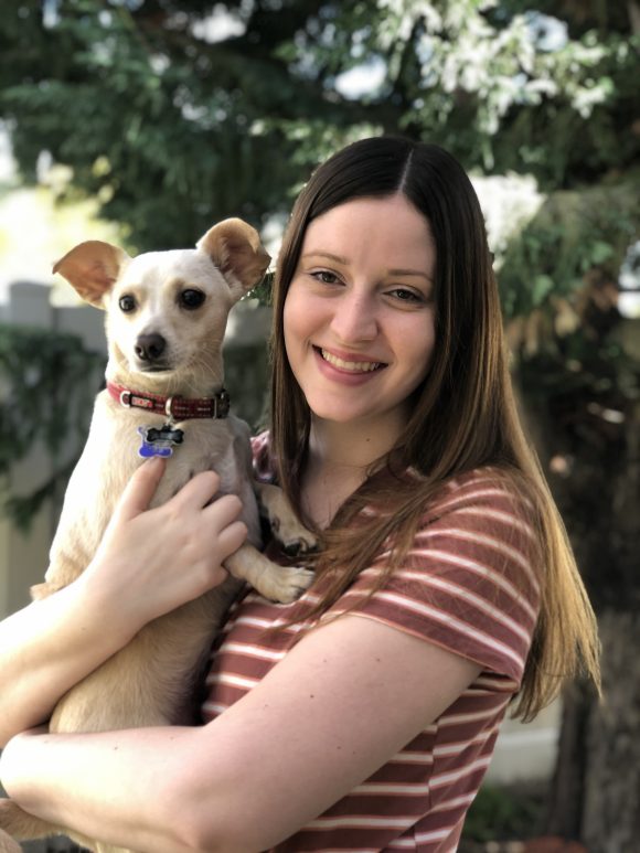 Woman Holding Dog