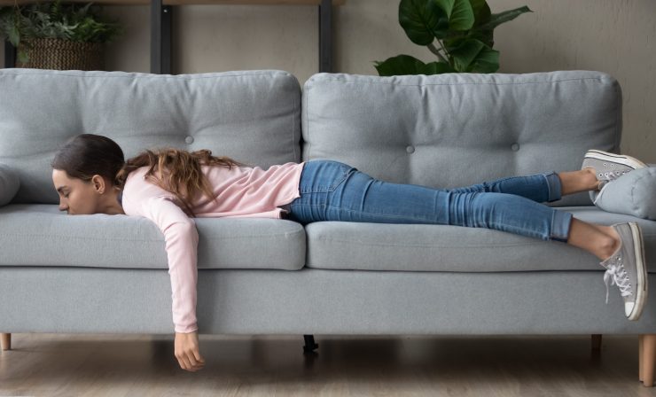 woman napping on couch
