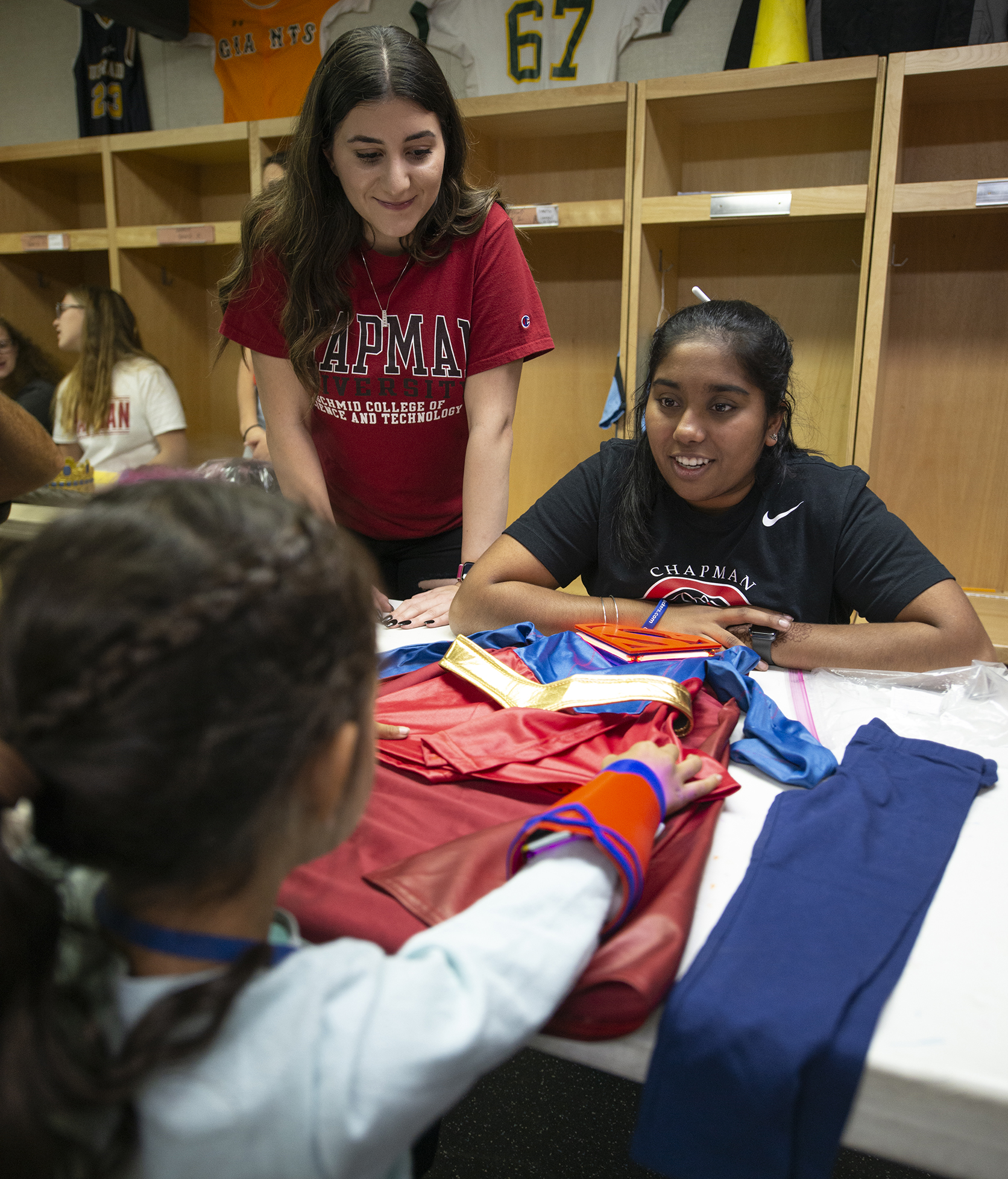 Sanika helps with a costume.