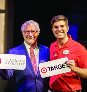 President Struppa poses next to a Chapman alumnus who is a Target corporate employee.