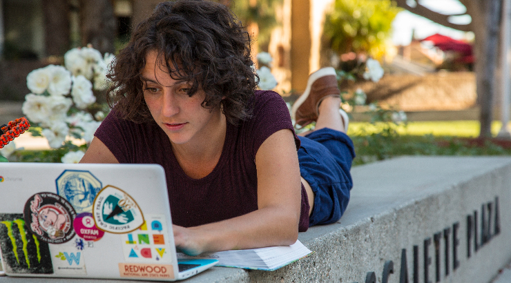 student working on laptop