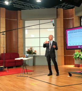 President Emeritus Jim Doti presented the annual Economic Forecast in a university studio, allowing thousands of viewers to watch the virtual event online.
