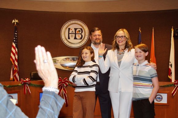 natalie moser and family in huntington beach council chamber