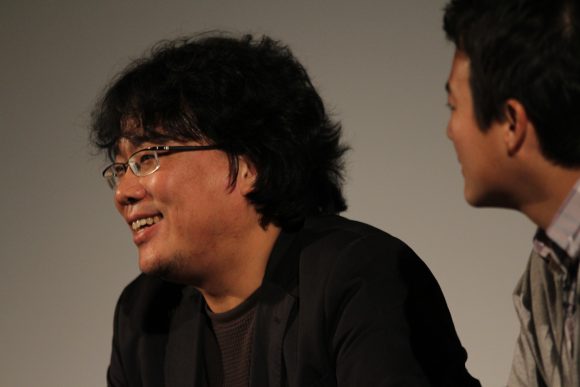 Image of Director Bong Jonn-Ho speaking at Chapman University's Busan International Film Festival in 2011.