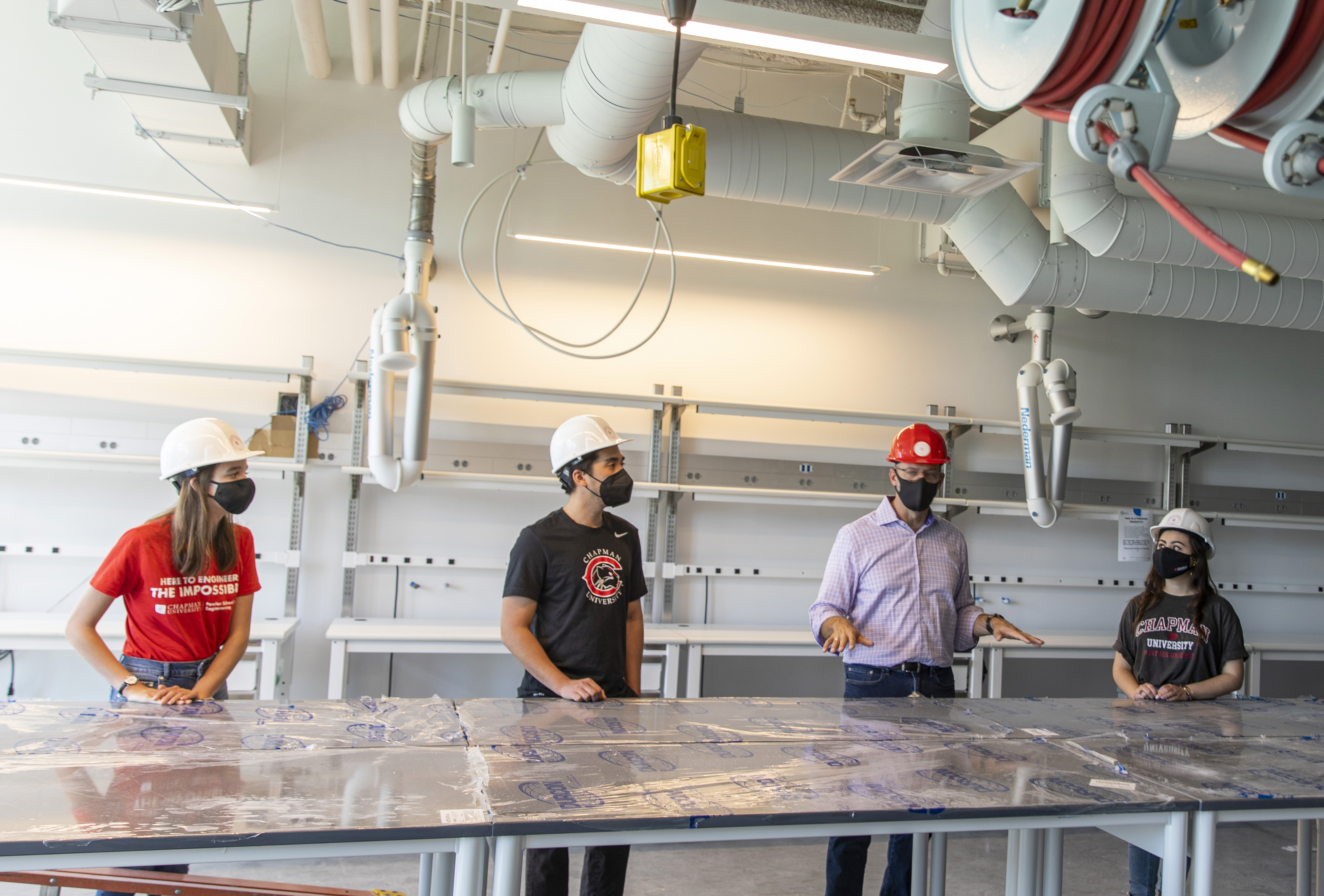 Dean Andrew Lyon and students in Swenson Hall. 