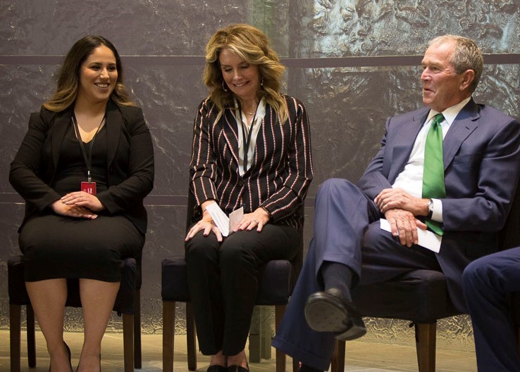 Chapman students sitting with President George W. Bush