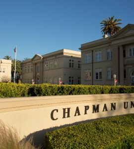 View of Chapman University sign and Memorial Hall.