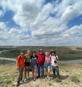 Gathered near the Montana dig site are Ghen Raz, Lila Motley, Casey Hoerman , Presidential Fellow and paleontologist Jack Horner, Sarah Wallace ’22 and Ben Tuschman '21.