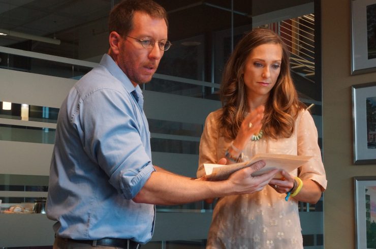 Chapman University Presidential Fellow Andrew Carroll receives Anna Miller’s handwritten recollection of her experience at Ground Zero on 9/11.