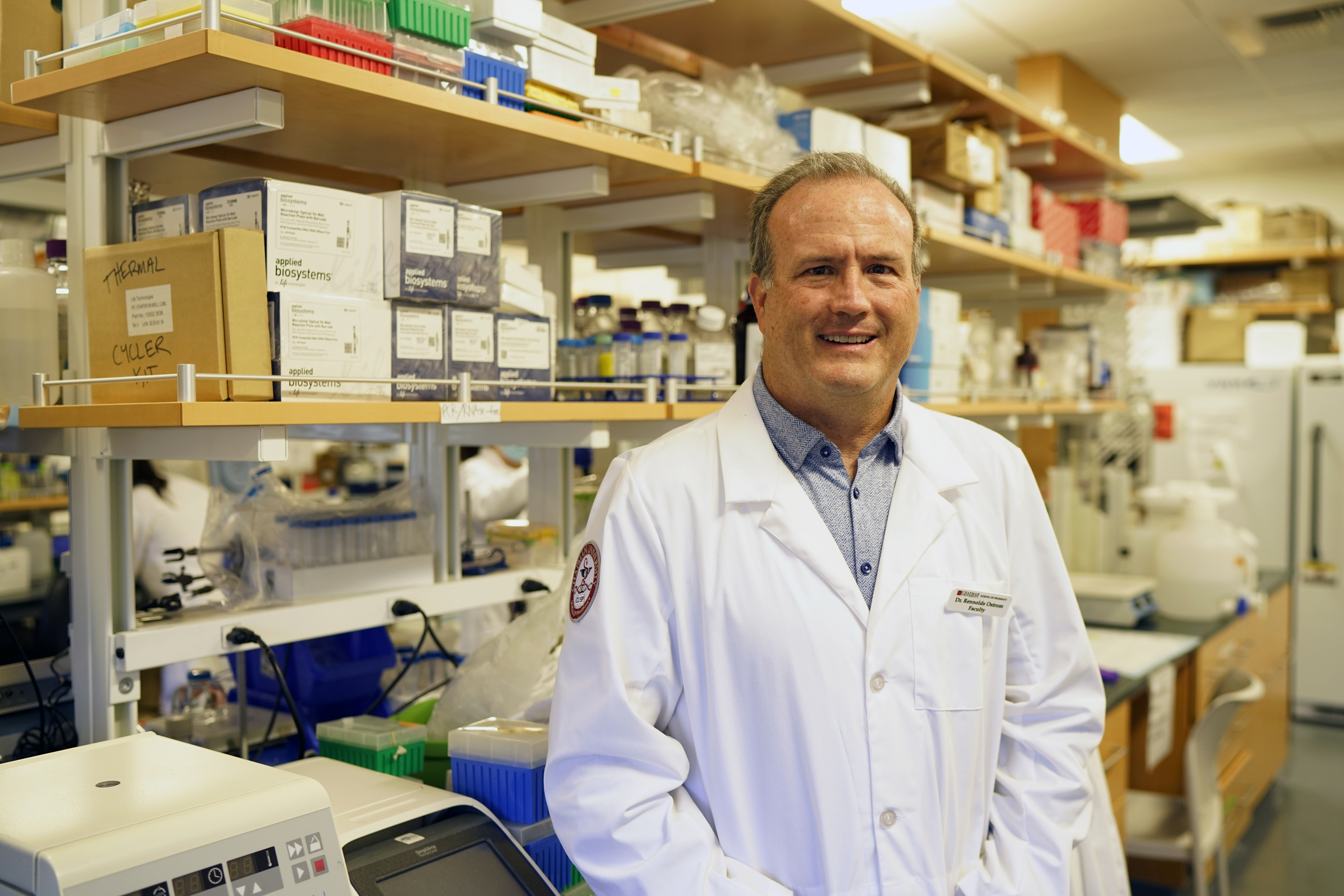 Rennolds Ostrom, professor in lab