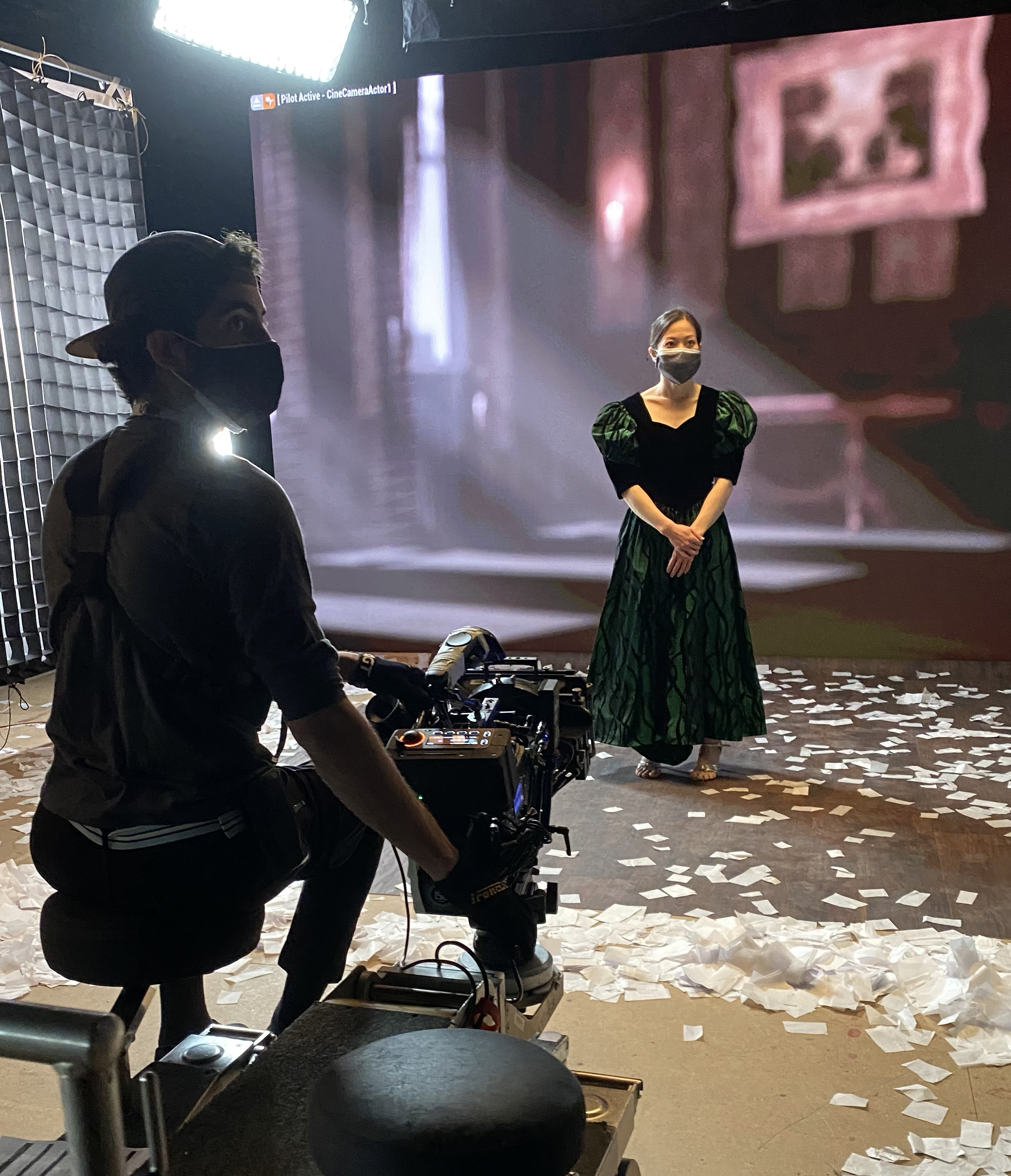 A ballroom dancer waits for her scene, at the new LED virtual production wall in the Digital Media Arts Center, which combines live-action and digital filmmaking