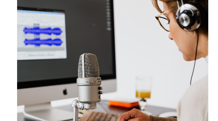 Woman records audio.