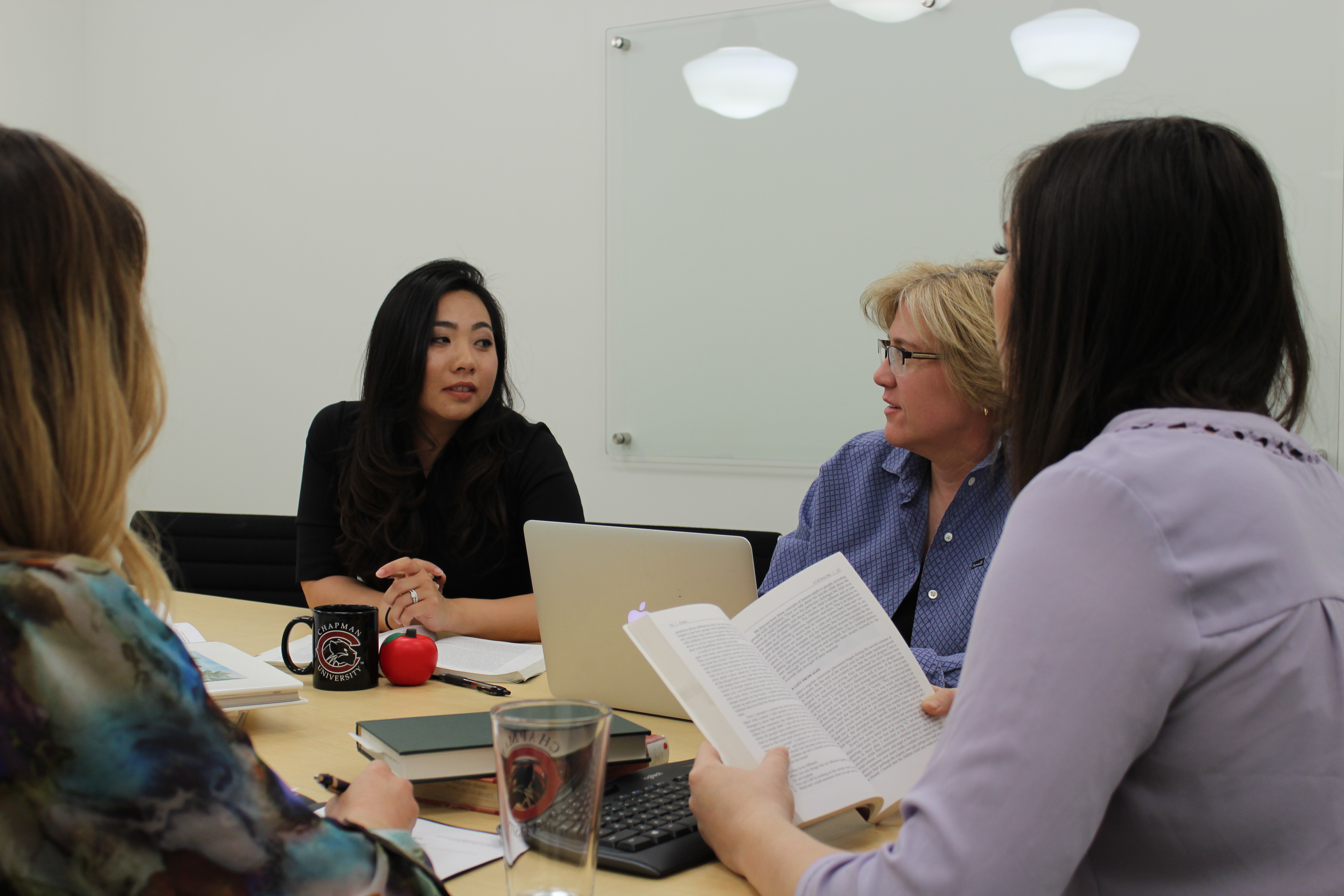 Students around the table learning