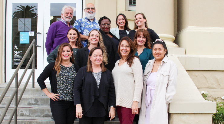 Thompson Policy Institute staff members pose on building steps.