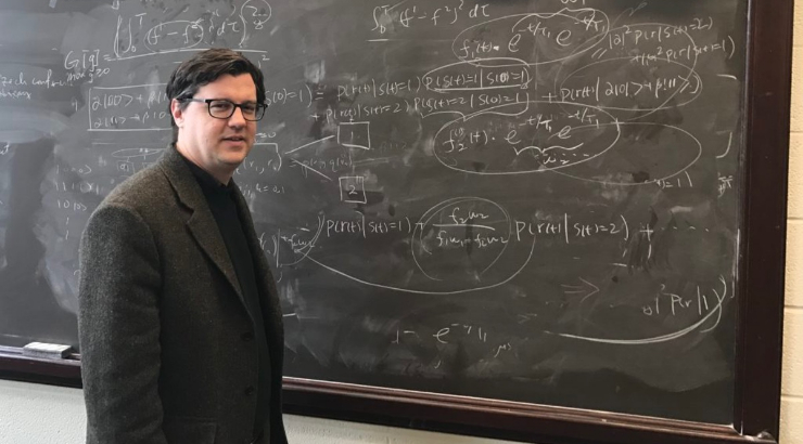 Andrew Jordan at the whiteboard