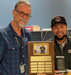 Vince Fernandez receives the Doroteo Sepulveda award.