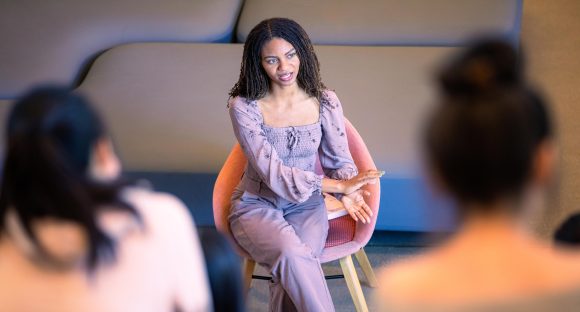 Leah Thomas speaks to students