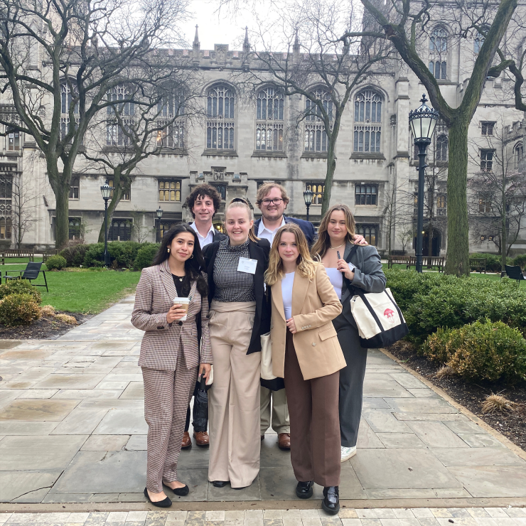 Chapman’s Undergraduate Law Review executive board poses in front of the University of Chicago at their conference.