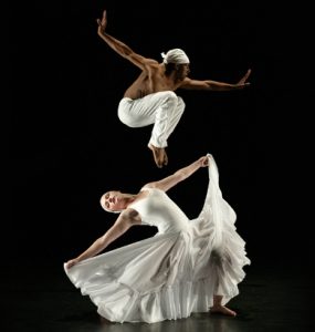 Dancer Stephen "tWitch" Boss leaps, with Chelsea Asman