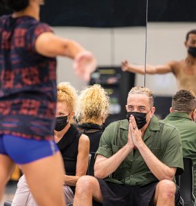 dwight rhoden watches dancers in rehearsal studio