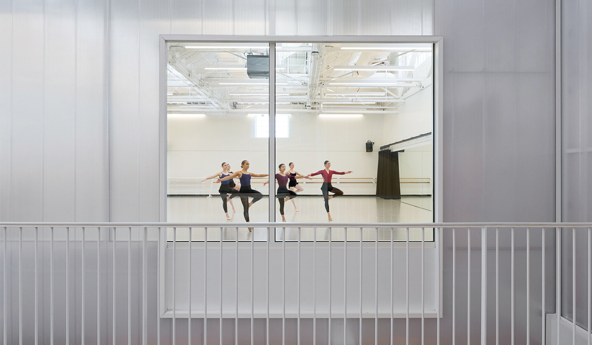 window view of dancers in studio
