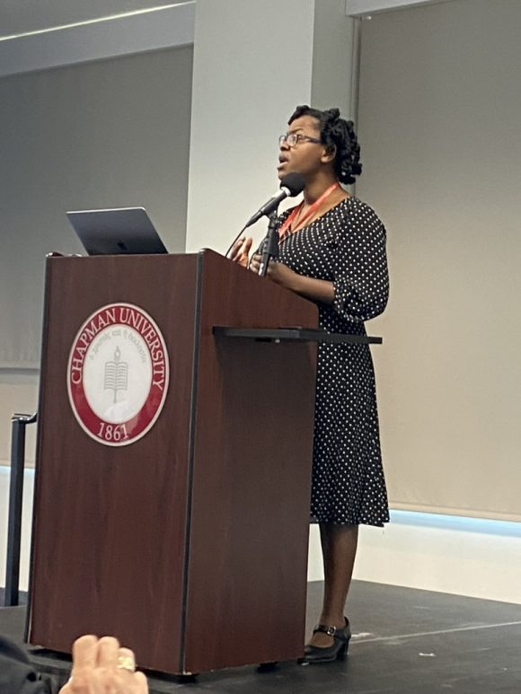 Janice P. De-Whyte at podium