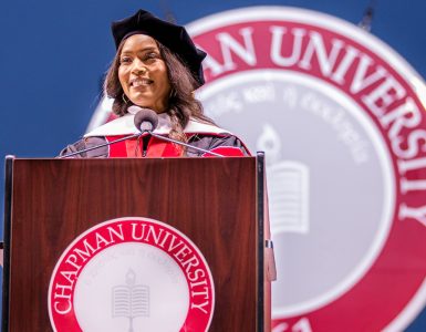 angela basset at podium with the chapman university seal behind her