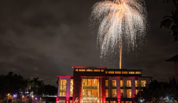 firework that looks like a palm tree over musco center at chapman university