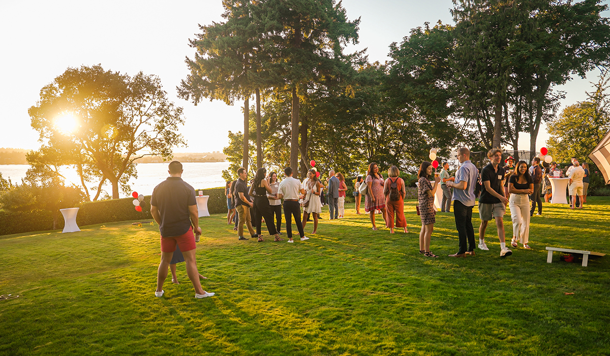 guests at garden party in golden light