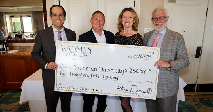 Women of Chapman presented a $250,000 check to the university at their annual summer luncheon.