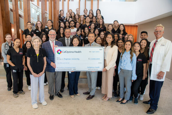 Chapman University, CalOptima leaders and physician assistant students at an event at Rinker Campus celebrating CalOptima's $5 million grant to support scholarships for PA students.