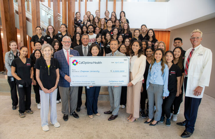 Chapman University, CalOptima leaders and physician assistant students at an event at Rinker Campus celebrating CalOptima's $5 million grant to support scholarships for PA students.