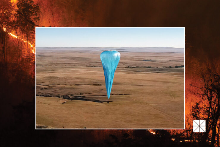 odd shaped balloon floats over dry landscape