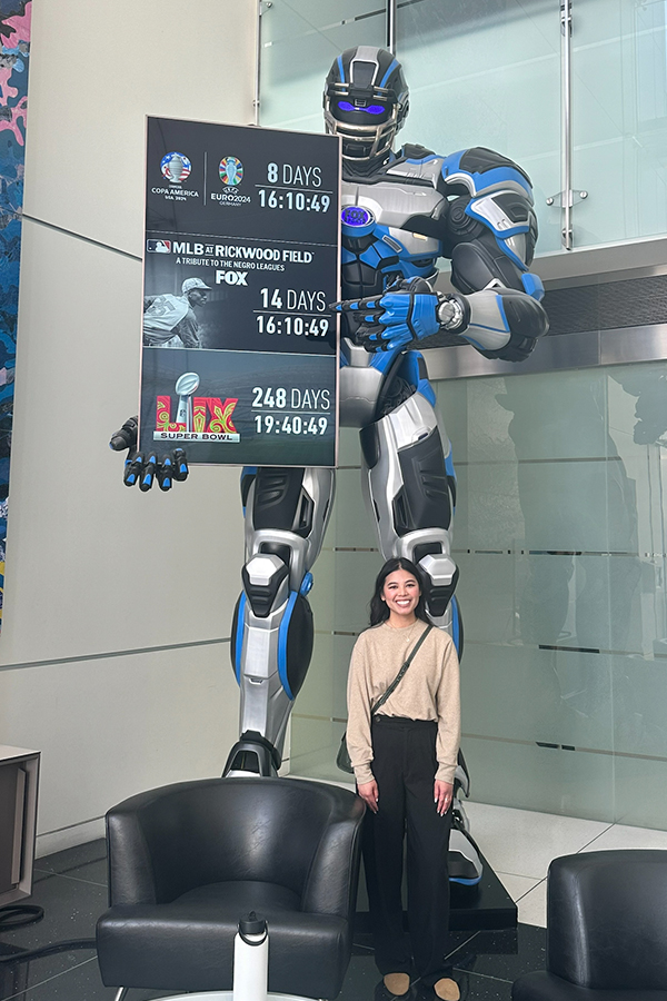 Danielle in front of lifesize transformer at fox studio