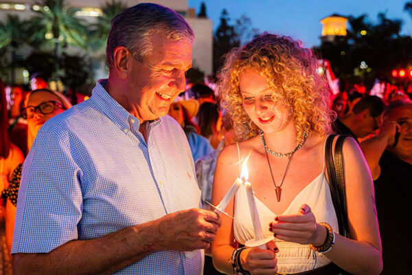 mark avery and daughter at candlelighting