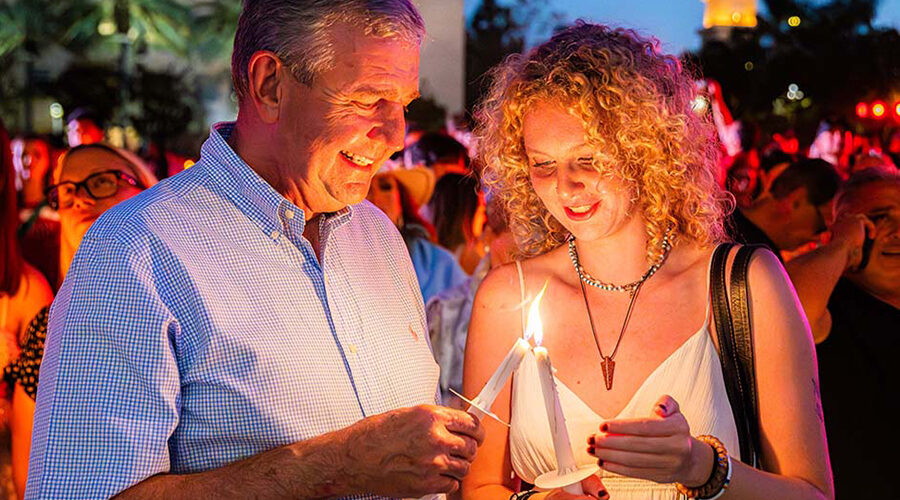 mark avery and daughter at candlelighting