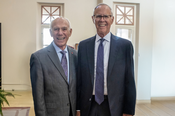 Chapman Board of Trustees Chair Jim Burra stands with former Chair Park Kennedy