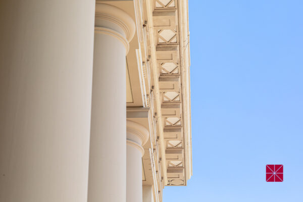 upshot of memorial hall roofline against blue sky