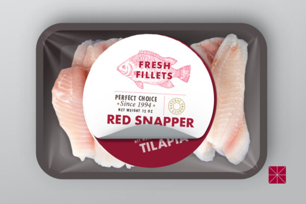 image of supermarket fish package labeled Red Snapper, but the label is peeling off revealing a second label saying Tilapia