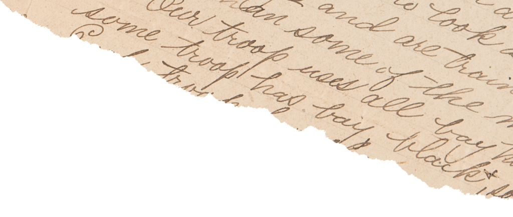 top corner of a torn letter
