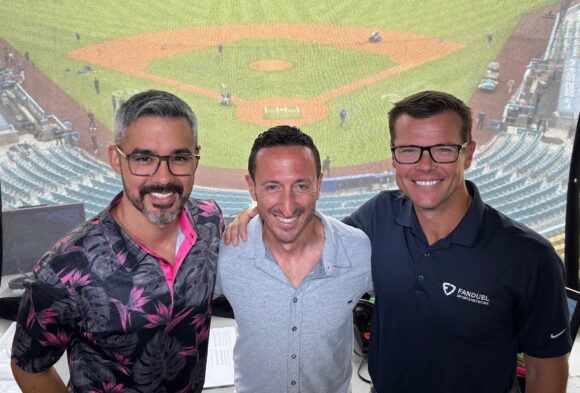 Stephen Nelson (left) and Jeff Levering (right) pose with a colleague (center) before