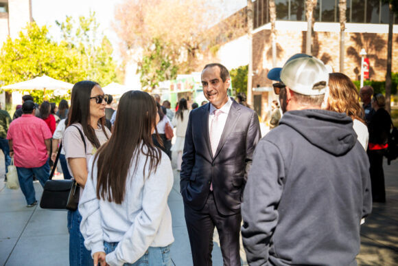 President Matt Parlow meets with prospective students and families.