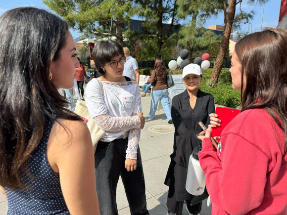 Breezy Mulan meets with admission team at Fall Open House.