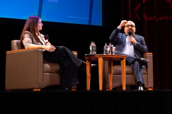 Dr. Vikki Katz and Ahmed Fouad Alkhatib on stage.