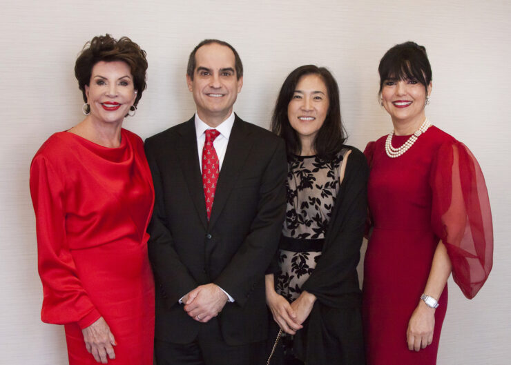 Pictured from left to right: Women of Chapman President Adrienne Brandes (MA ’84), Chapman President Matt Parlow, Professor Janine Kim, and Christmas at The Ritz Chair Jacqui Penner.