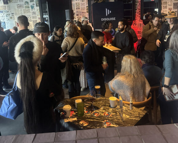 Attendees chat at Chapman Alumni Mixer.