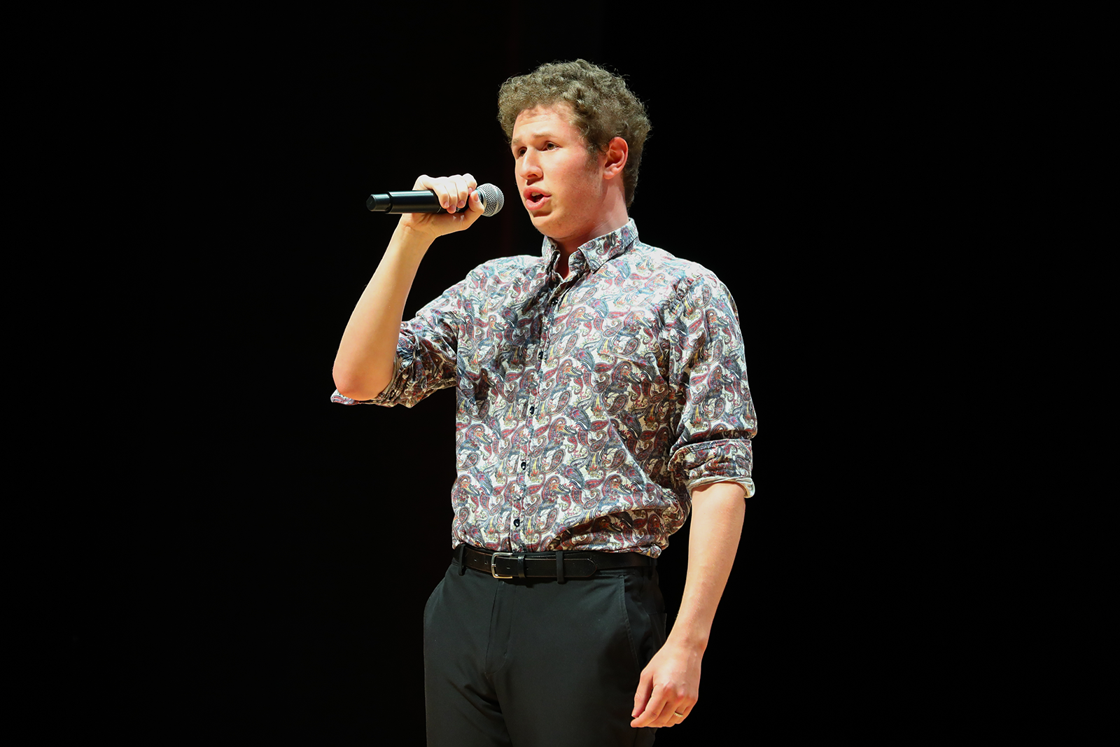 Chapman student Austin Elkins, a Vocal Performance major who has performed at Carnegie Hall and the Sydney Opera House, sang the national anthem to open the Orange State of the City event